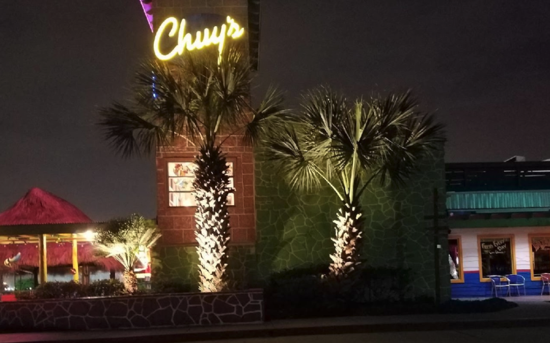Local business Chuy's in Richmond Texas features a custom commercial outdoor lighting design.