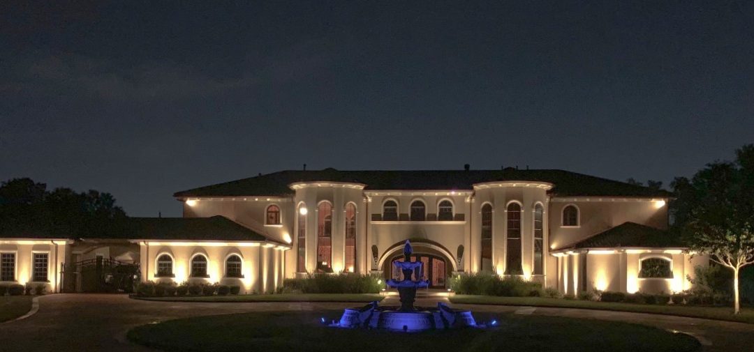 Houston Lightscapes added curb appeal to this Texas property through landscape lighting