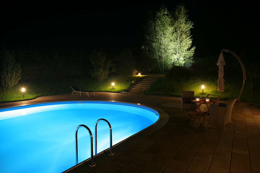 Existing Pool illuminated with lit pathway surroundings