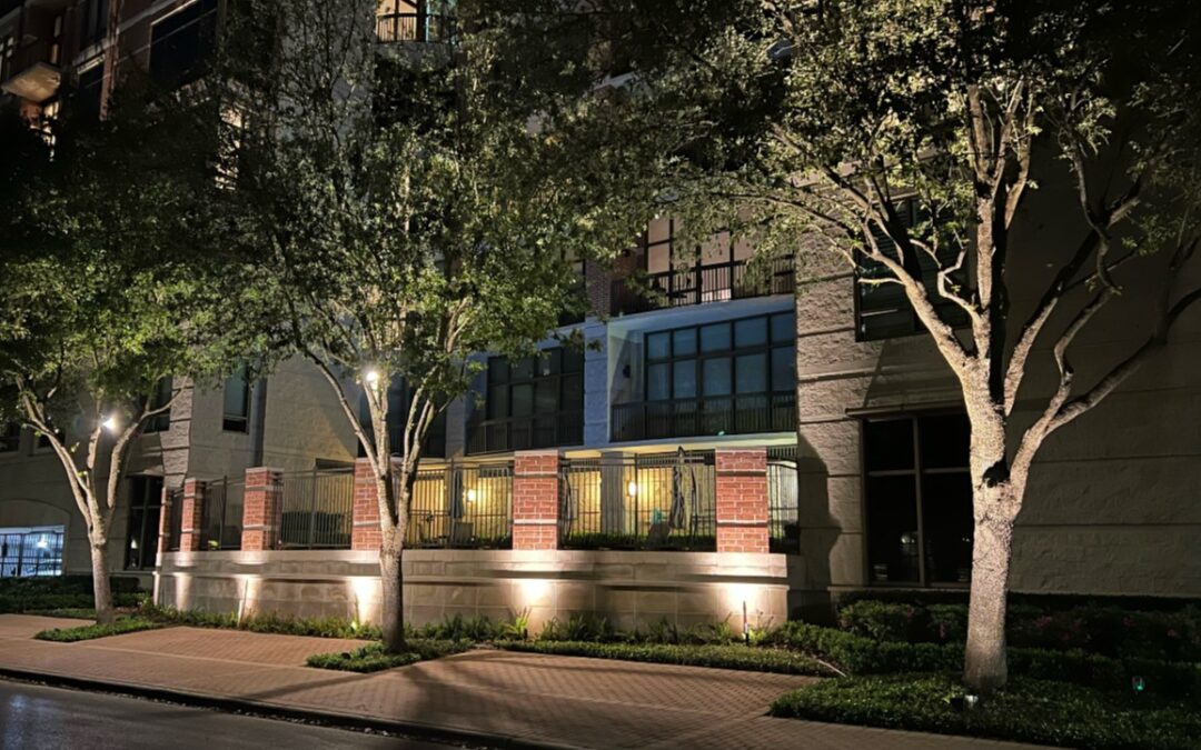 Outdoor lighting illuminates apartment exterior