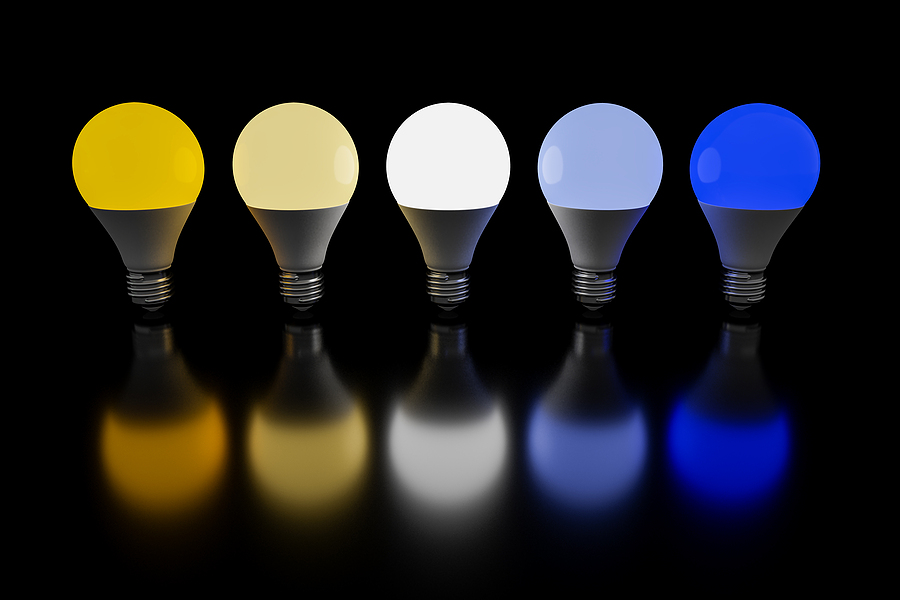 Row of light bulbs lit with warm and cool colors. Lighting concept and energy saving. 3d render. Fall
