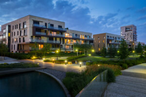 The Green part with modern houses in the background. Apartment buildings