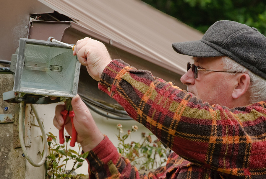 man preparing the lighting outdoors